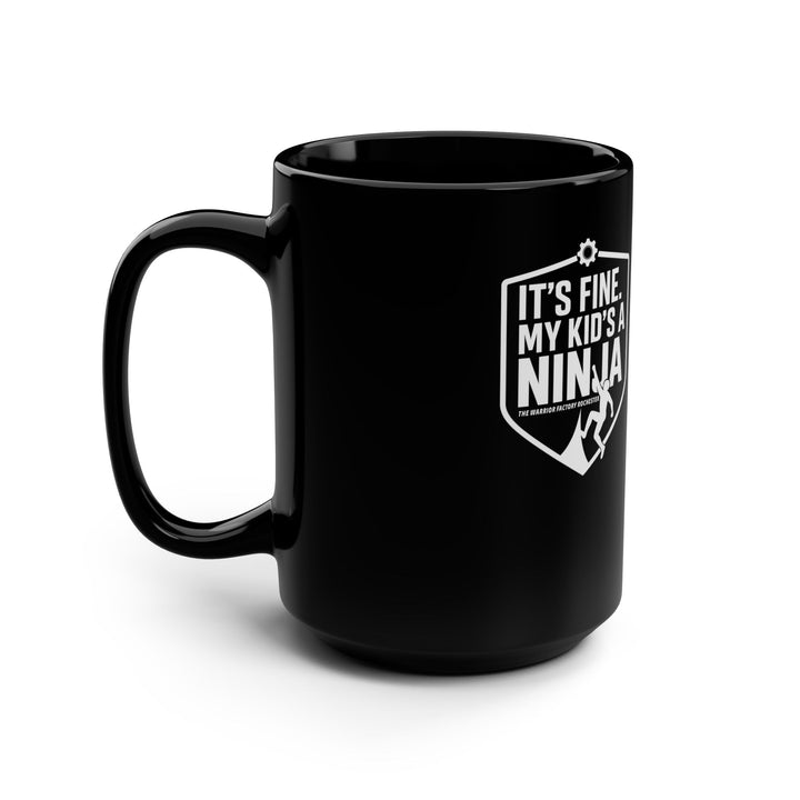 Black 15oz Mug — “It’s Fine, My Kid’s a Ninja” Parent Coffee Cup